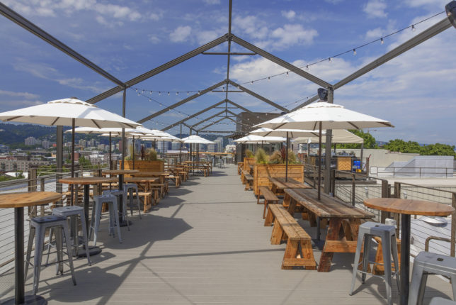 A long shot of the outdoor seating on the roof deck.